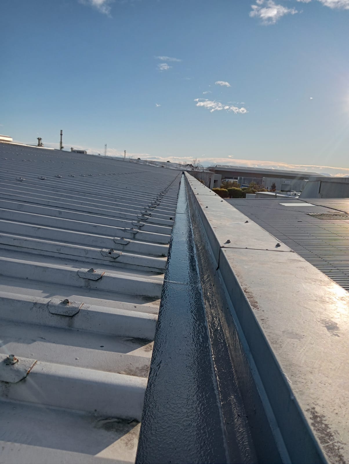 Commercial gutter after waterproofing